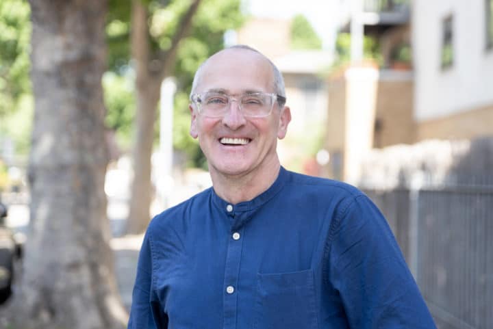 David Warner wearing a blue shirt