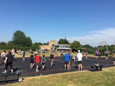 People playing basketball on the new basketball court in Westwood and Ravensthorpe 